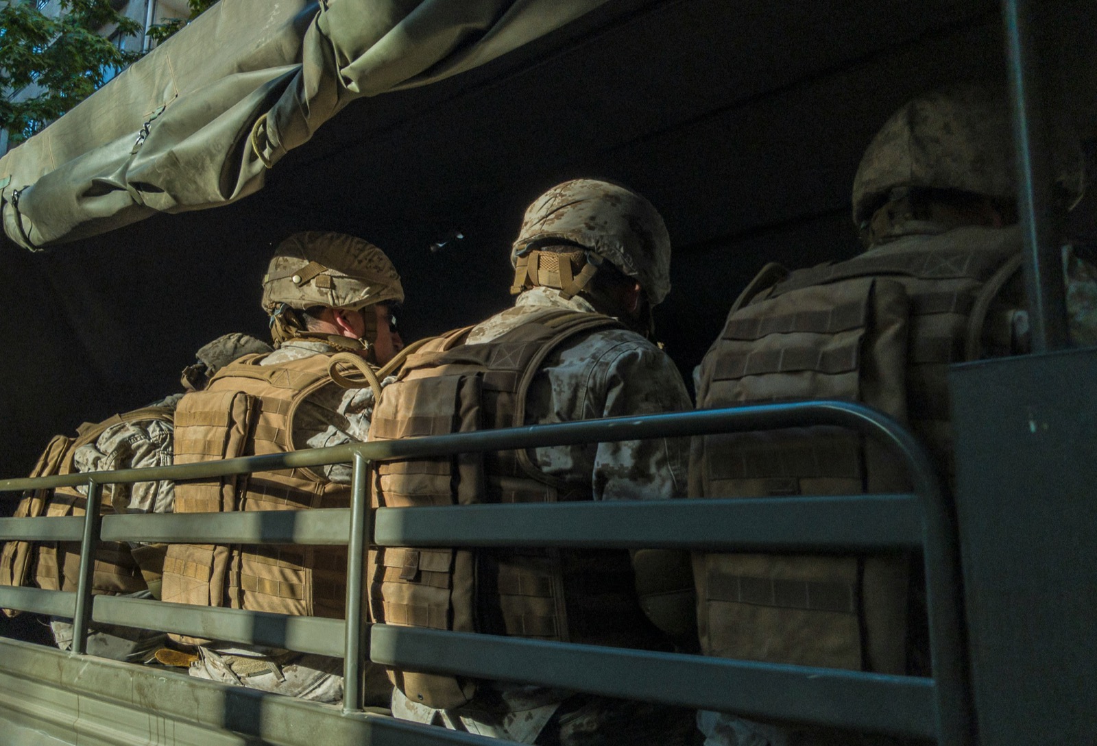 Military personnel in field-grade uniforms